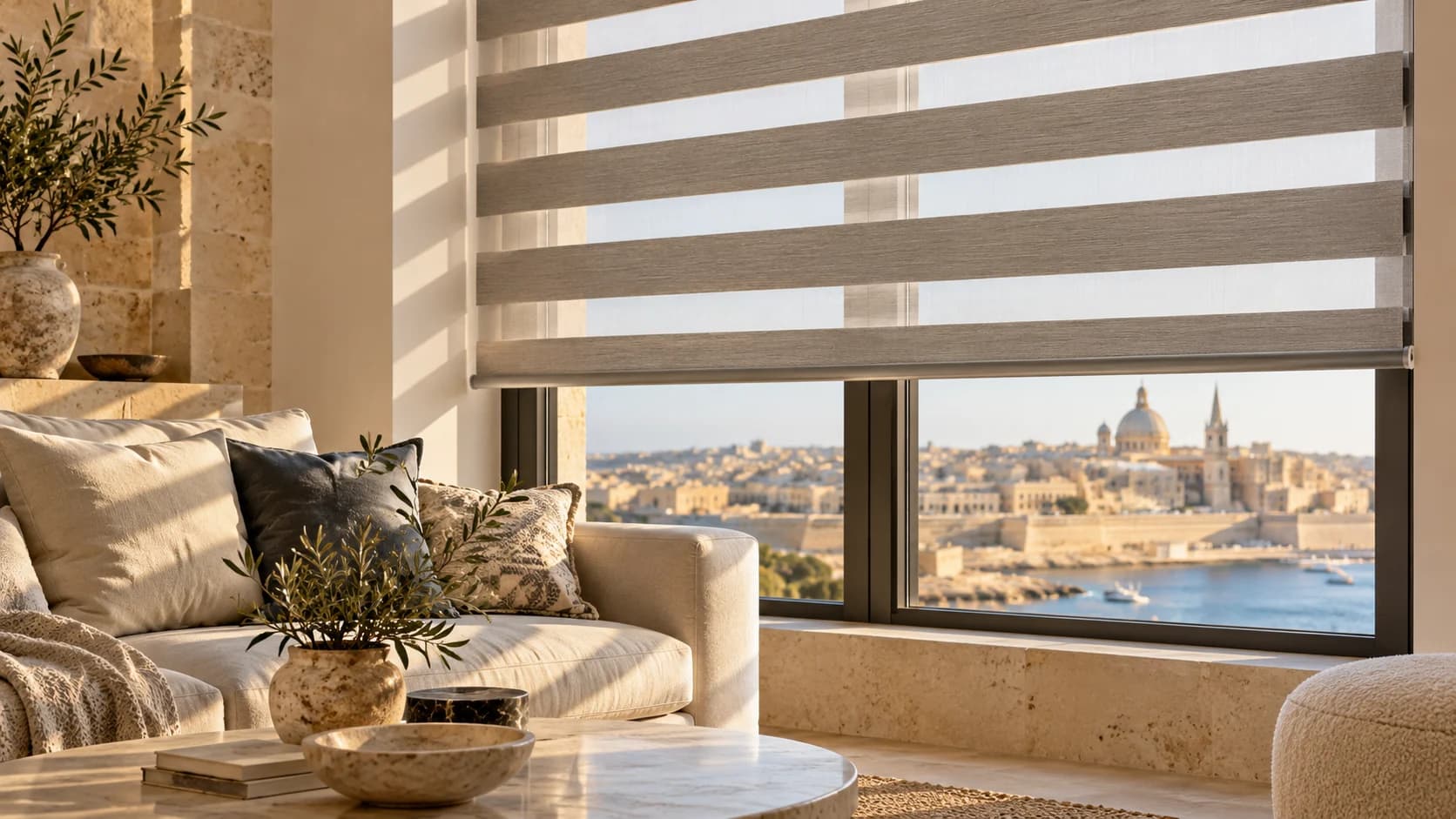 Alternating sheer and opaque bands on a zebra blind in a sunlit living room